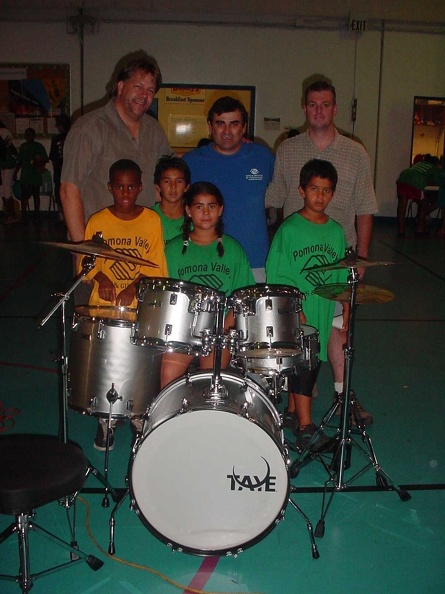 B&G Taye donates drums.JPG